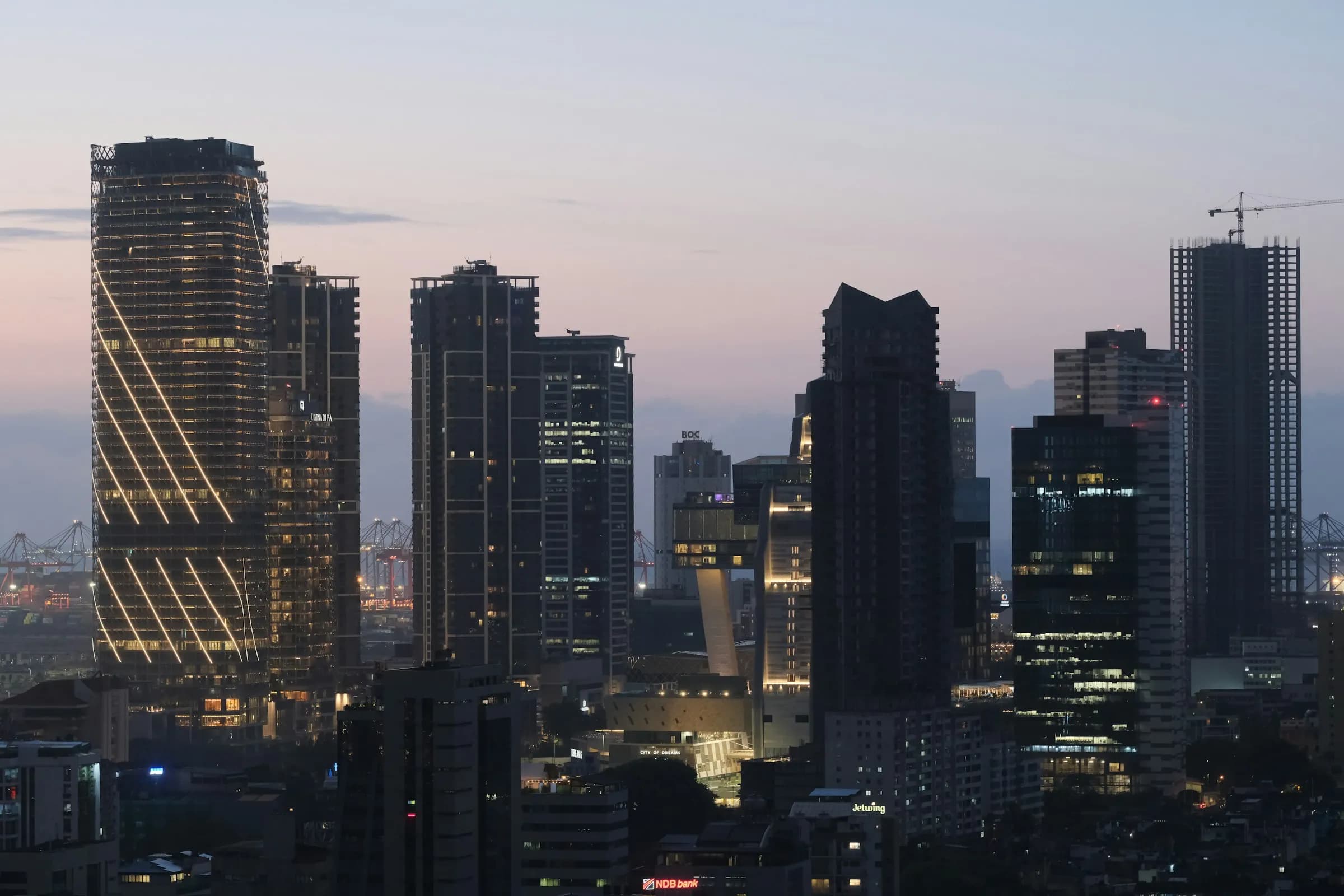 The Colombo skyline at dusk, where the Zaptra studio is based